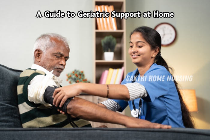 A smiling nurse from Sakthi Home Nursing in Coimbatore checking the blood pressure of an elderly man at home