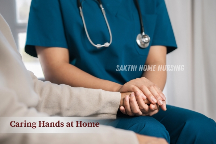 Nurse gently holding an elderly patient's hand, representing the compassionate home care services by Sakthi Home Nursing