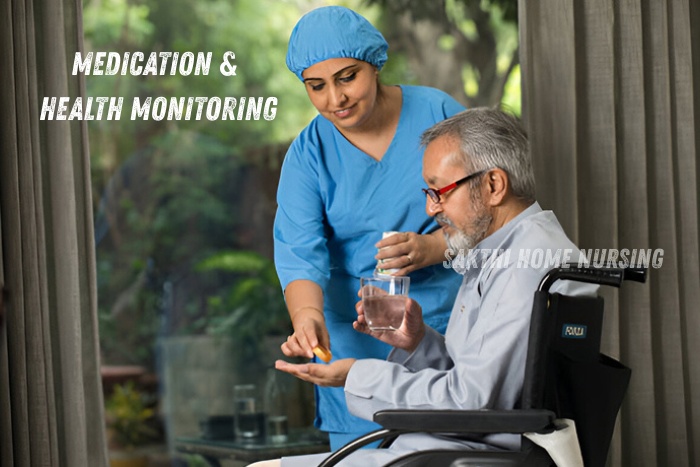 Sakthi Home Nursing caregiver in Coimbatore assisting an elderly man with medication and daily health monitoring at home